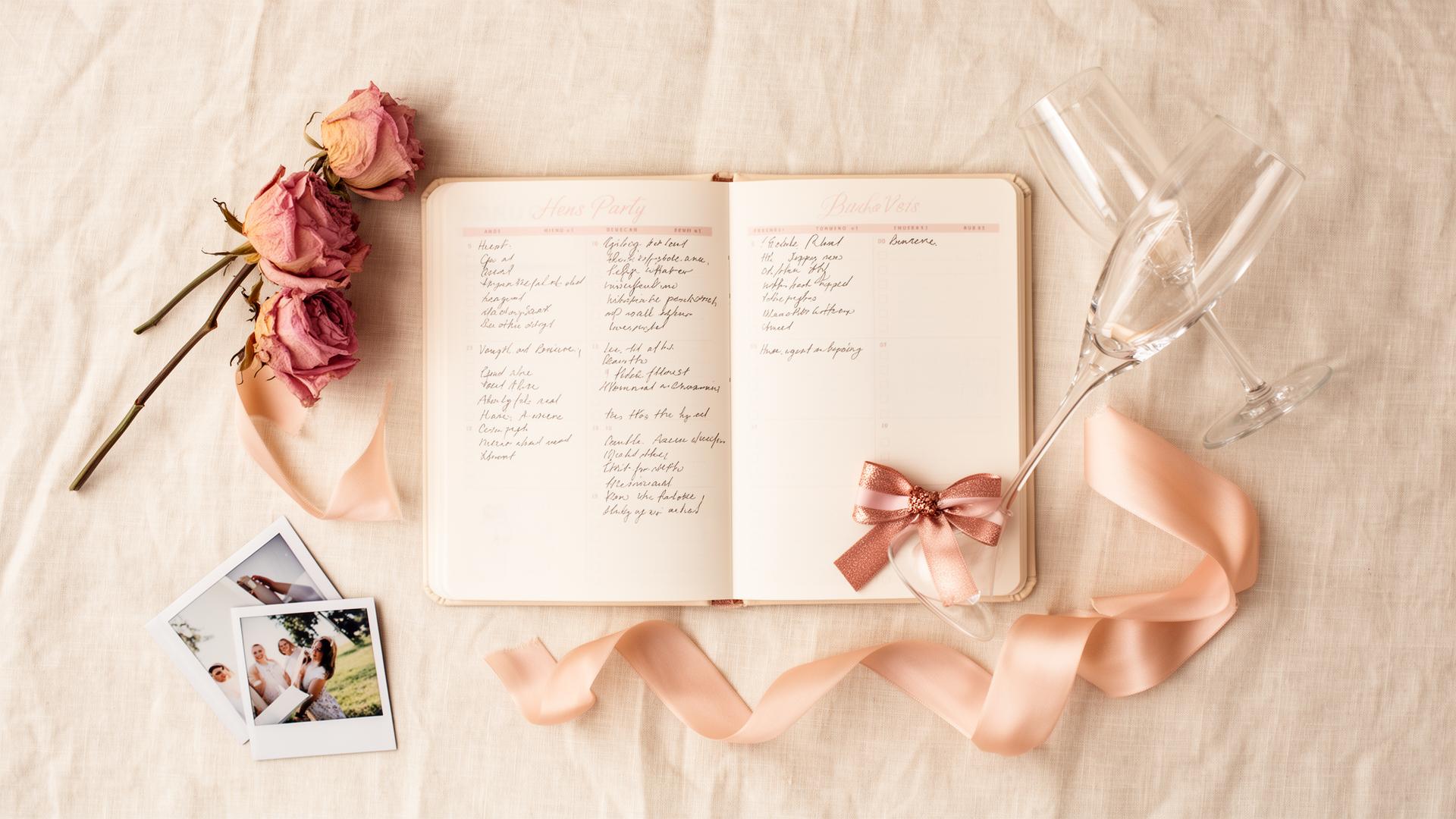 Hens Planner — editorial flat-lay